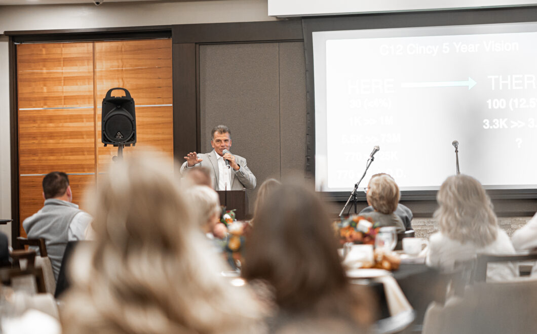 Randy Warwick speaking at a C12 Banquet.